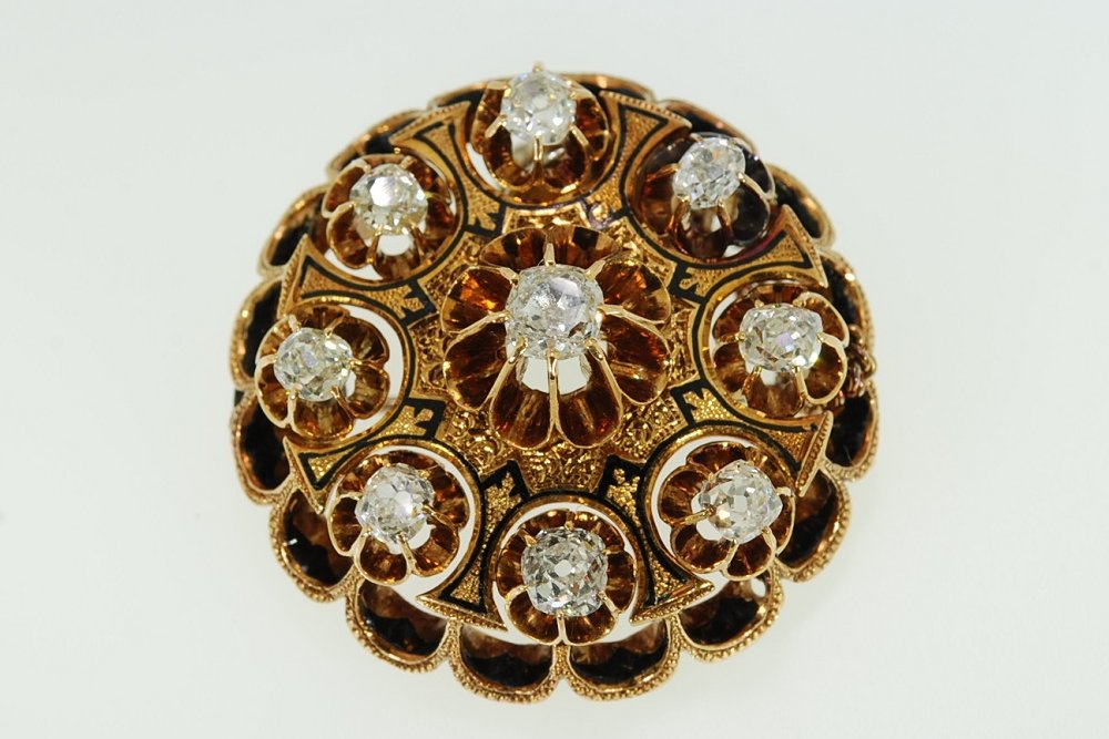 Antique Victorian gold buttercup brooch with old mine-cut diamonds and black enamel